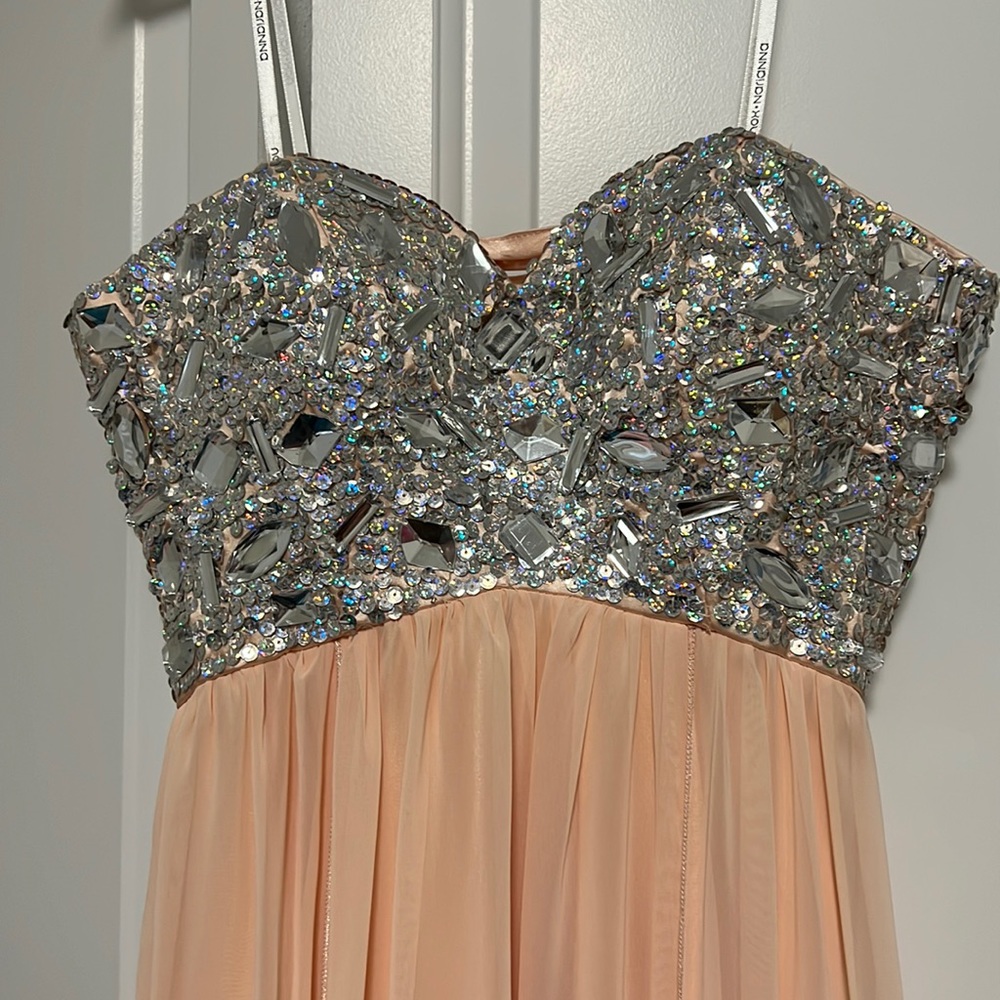 Light peach XS formal dress. Worn one for military ball strapless